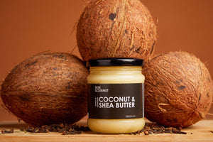 a picture of three coconuts and a jar of coconut and Shea butter 